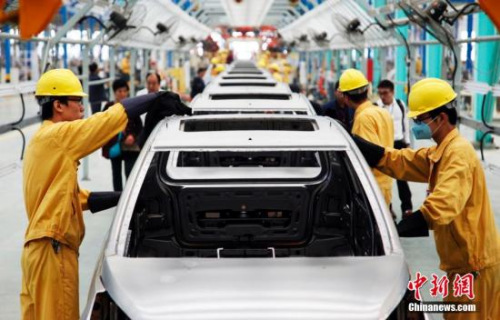 Data Map: China advanced new energy vehicle production line was put into production in Weihai. Photo by Liu Changyong